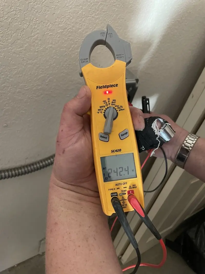 Voltage testing with clamp meter during Outlet Installation in New Kensington